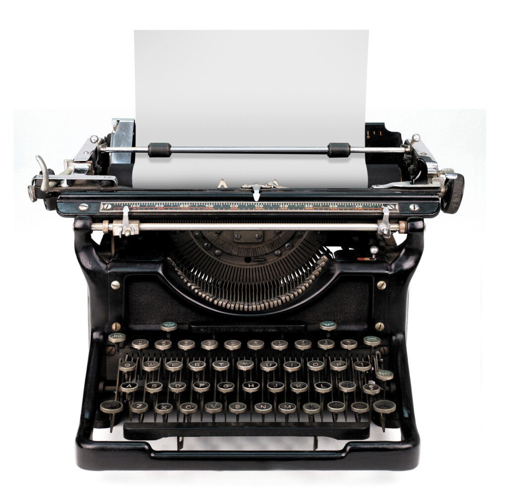 blank sheet in a typewriter quali sono, oggi, le parole giuste per raccontare il Natale?
