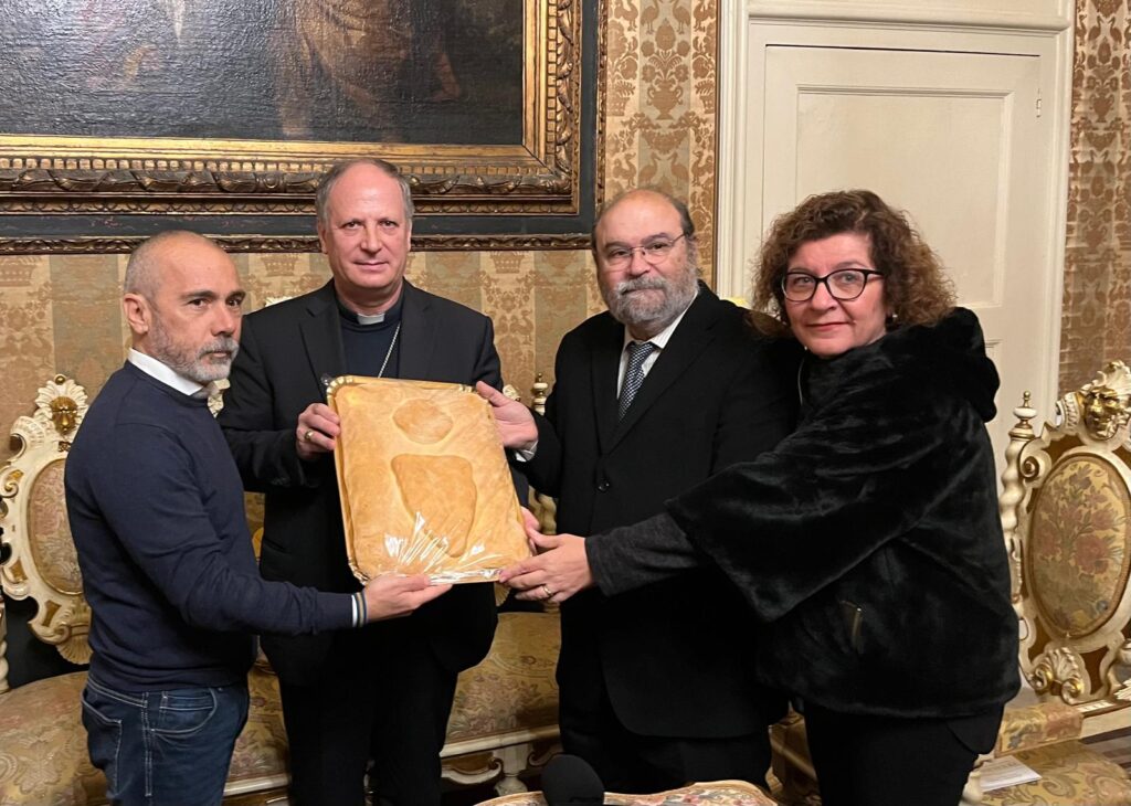 la consegna del pane per i poveri